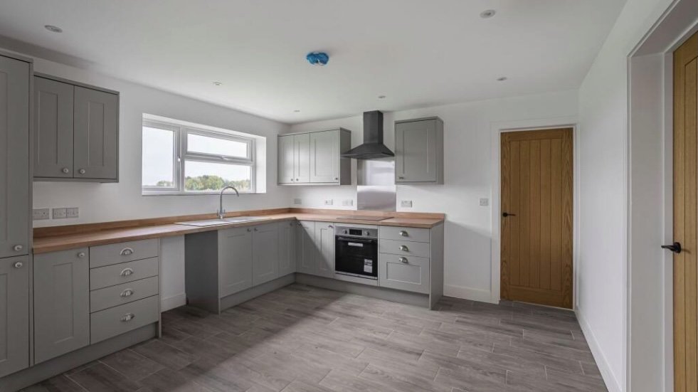 Renovated three bed countryside home near Cambridge lists for £600,000 with 5.5 acres of grassland, huge potential, planning permission and stunning open views.