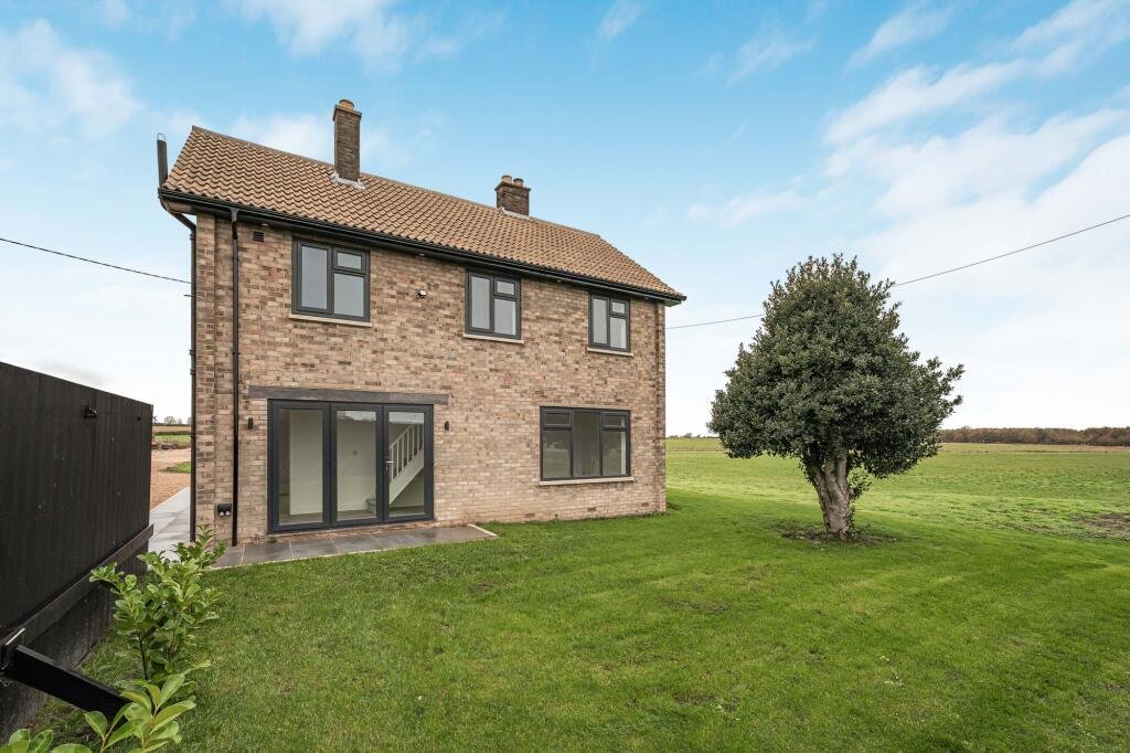 Renovated three bed countryside home near Cambridge lists for £600,000 with 5.5 acres of grassland, huge potential, planning permission and stunning open views.