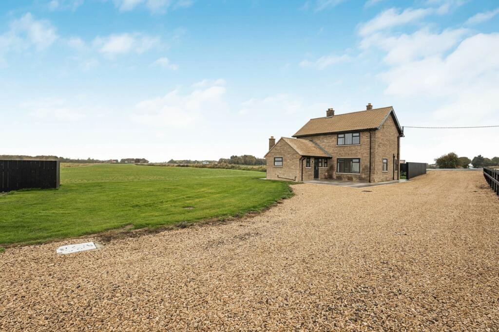 Renovated three bed countryside home near Cambridge lists for £600,000 with 5.5 acres of grassland, huge potential, planning permission and stunning open views.