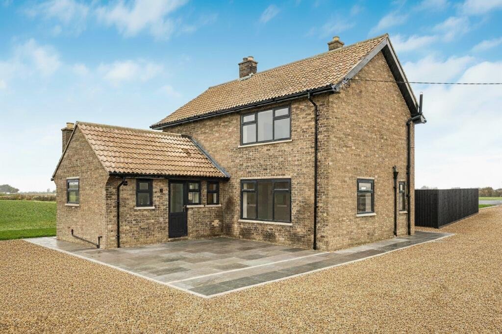 Renovated three bed countryside home near Cambridge lists for £600,000 with 5.5 acres of grassland, huge potential, planning permission and stunning open views.