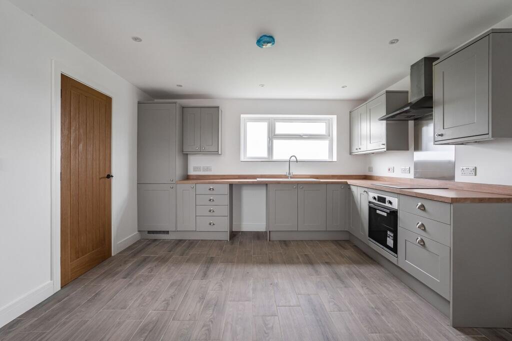 Renovated three bed countryside home near Cambridge lists for £600,000 with 5.5 acres of grassland, huge potential, planning permission and stunning open views.