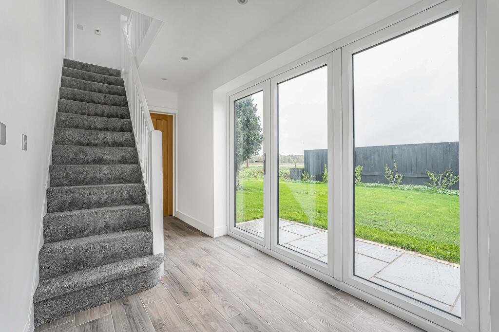 Renovated three bed countryside home near Cambridge lists for £600,000 with 5.5 acres of grassland, huge potential, planning permission and stunning open views.