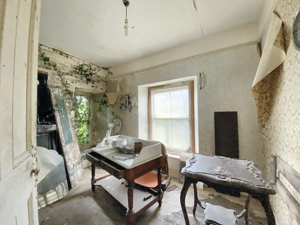 A £250,000 three bedroom home in Pembrokeshire is so derelict buyers are warned to enter at their own risk, offering two acres, huge renovation potential and countryside views.