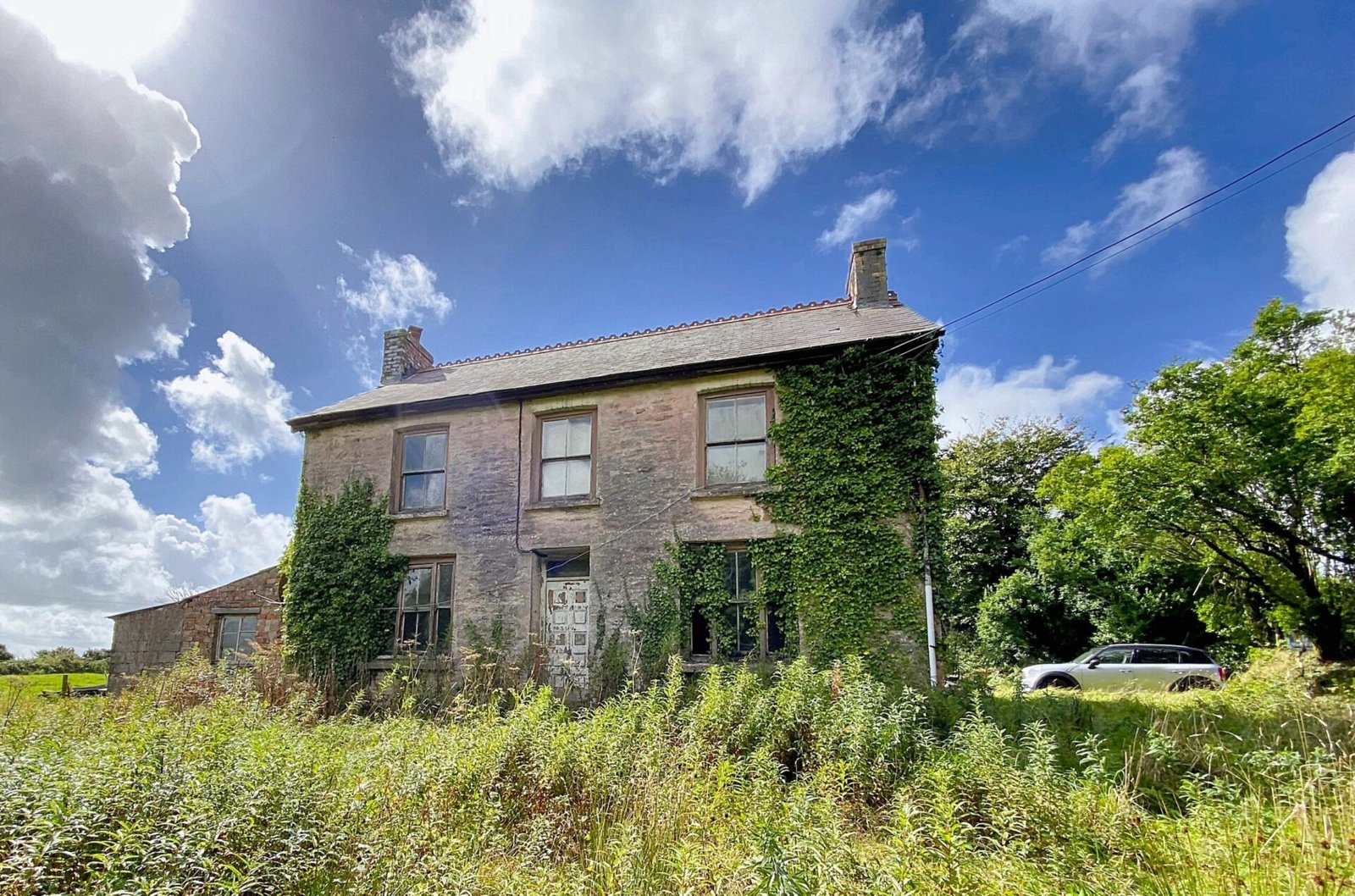 A £250,000 three bedroom home in Pembrokeshire is so derelict buyers are warned to enter at their own risk, offering two acres, huge renovation potential and countryside views.