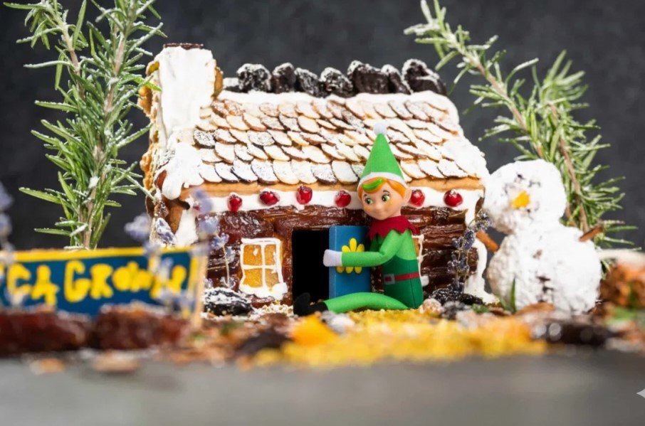 A £5 gingerbread house listing delights buyers with sweet themed rooms and candy features, offering a charity raffle entry for a real treat while raising funds for an animal shelter.