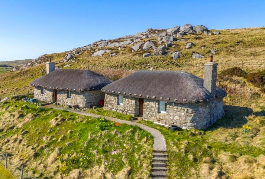 Two charming pre 1900 cottages on a secluded Scottish island have gone on sale for £390,000, offering peaceful countryside views and a rare slice of traditional island life