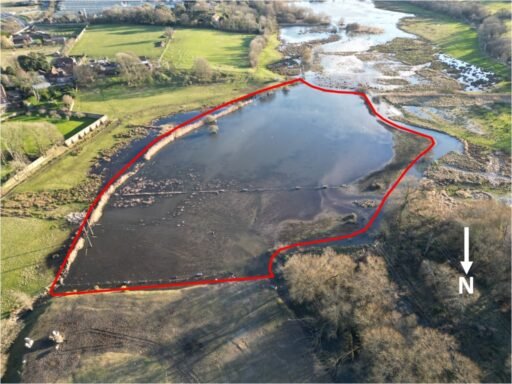 Six acres of flood-prone land beside the River Meon is for sale at £250,000, with buyers warned to bring waders as much of the soggy field sits underwater each winter no.