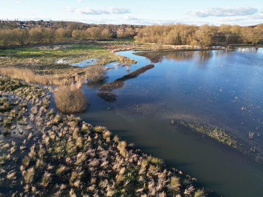 Six acres of flood-prone land beside the River Meon is for sale at £250,000, with buyers warned to bring waders as much of the soggy field sits underwater each winter no.