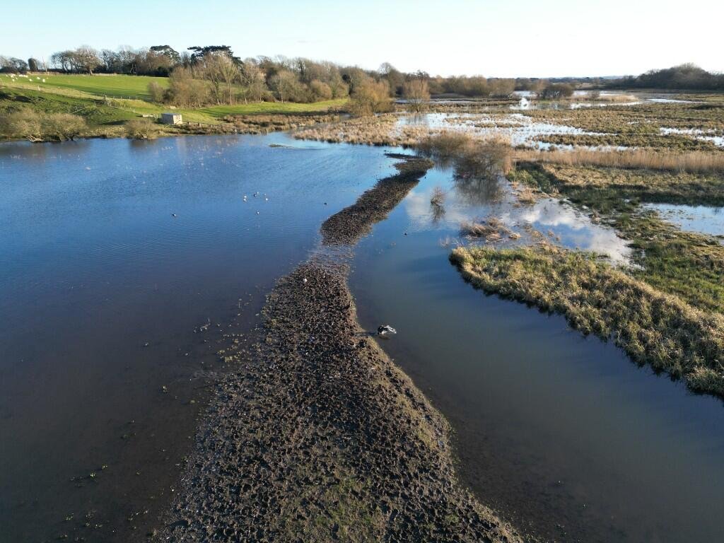 Six acres of flood-prone land beside the River Meon is for sale at £250,000, with buyers warned to bring waders as much of the soggy field sits underwater each winter no.