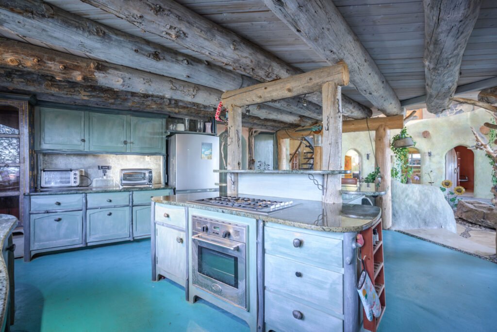 A whimsical pink dome home inspired by rainforests and desert landscapes has gone on sale for £1.2m, offering eco luxury, yoga domes and magical interiors in New Mexico