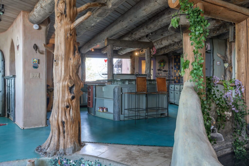 A whimsical pink dome home inspired by rainforests and desert landscapes has gone on sale for £1.2m, offering eco luxury, yoga domes and magical interiors in New Mexico