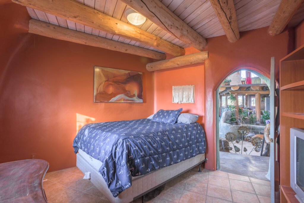 A whimsical pink dome home inspired by rainforests and desert landscapes has gone on sale for £1.2m, offering eco luxury, yoga domes and magical interiors in New Mexico