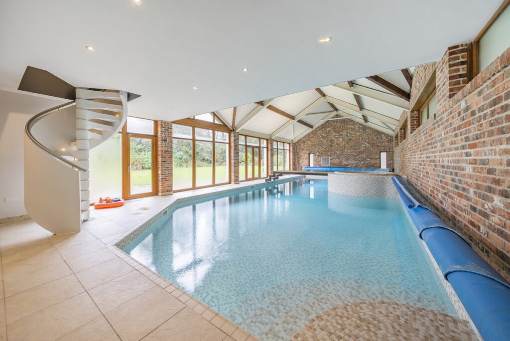 Lavish seven-bedroom Leeds mansion linked to a Premier League star hits market for £3.5m, boasting pool, cinema, sunken lounge and high-tech luxury living.