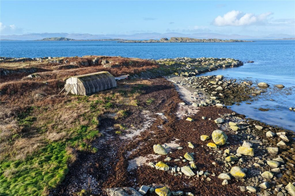 Stunning Scottish island with boathouse and sweeping sea views goes on sale for £50,000, but buyers are warned access is dangerous due to fast changing tides