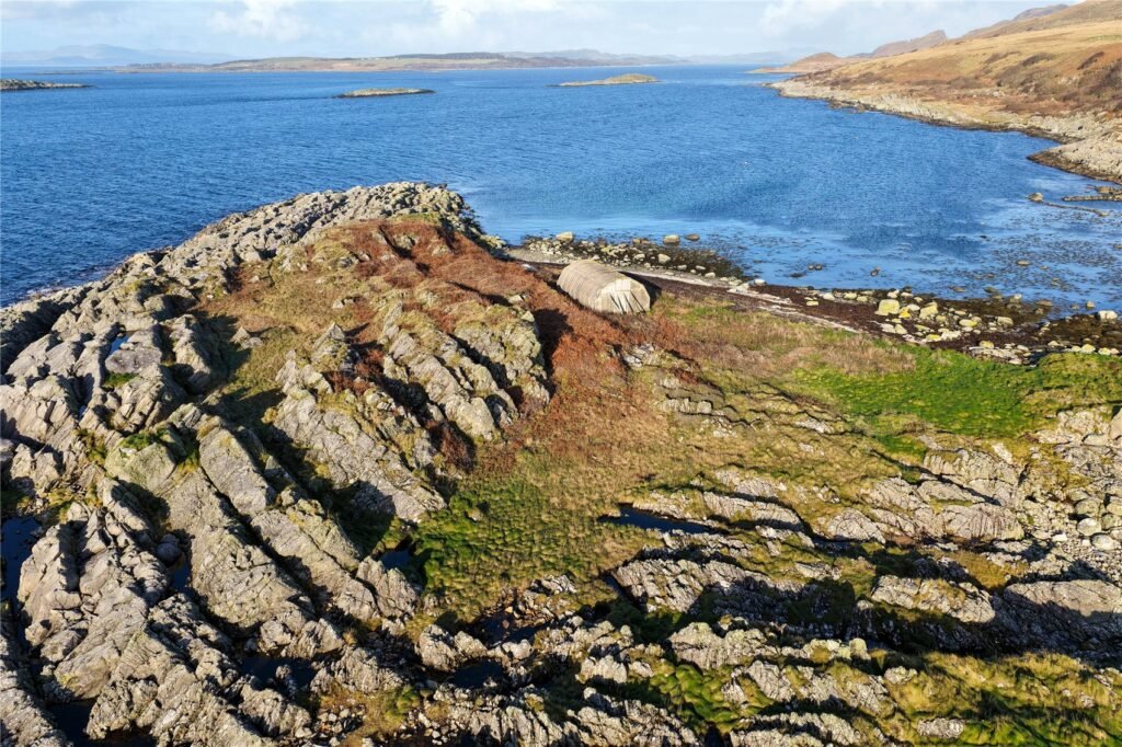 Stunning Scottish island with boathouse and sweeping sea views goes on sale for £50,000, but buyers are warned access is dangerous due to fast changing tides