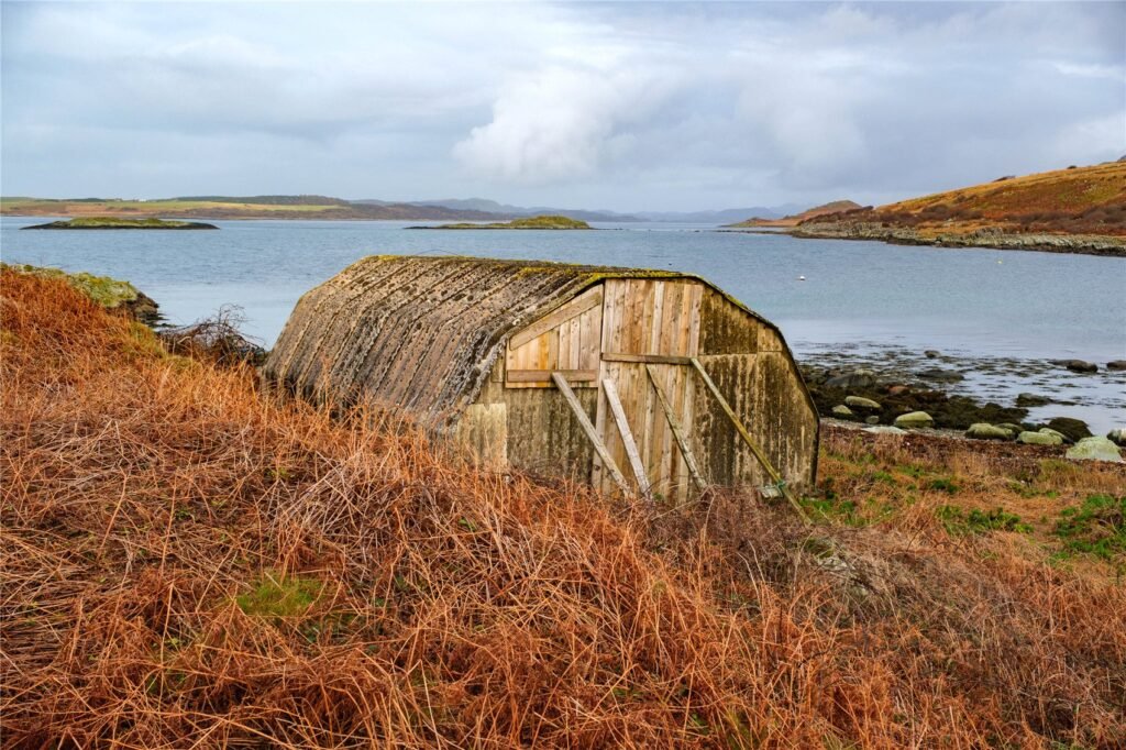Stunning Scottish island with boathouse and sweeping sea views goes on sale for £50,000, but buyers are warned access is dangerous due to fast changing tides