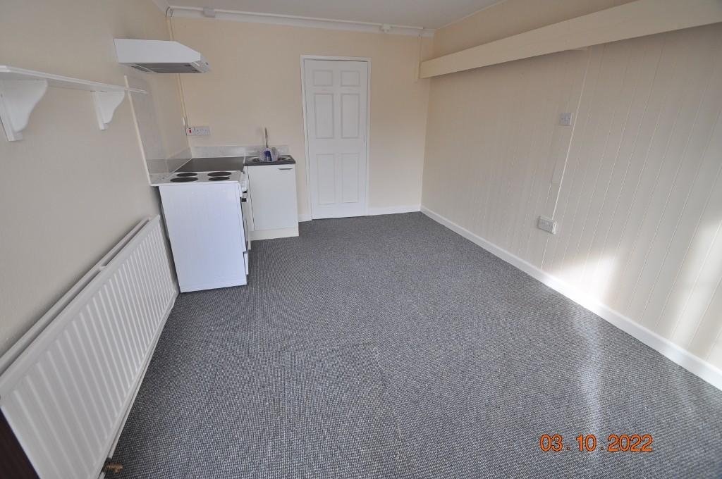 Tiny studio flat squeezed beside a homeowner’s front door hits the rental market for £675 a month, with all bills included and one parking space despite its porch like size