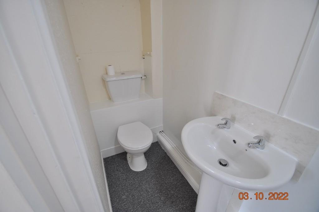 Tiny studio flat squeezed beside a homeowner’s front door hits the rental market for £675 a month, with all bills included and one parking space despite its porch like size