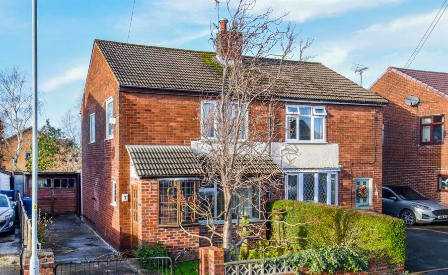 A three bedroom home priced at £130,000 has caught attention for its unusual layout, featuring a fully plumbed toilet sitting openly inside a glass conservatory