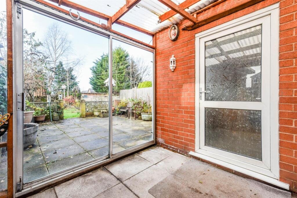 A three bedroom home priced at £130,000 has caught attention for its unusual layout, featuring a fully plumbed toilet sitting openly inside a glass conservatory