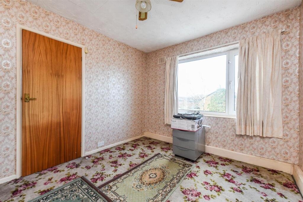 A three bedroom home priced at £130,000 has caught attention for its unusual layout, featuring a fully plumbed toilet sitting openly inside a glass conservatory