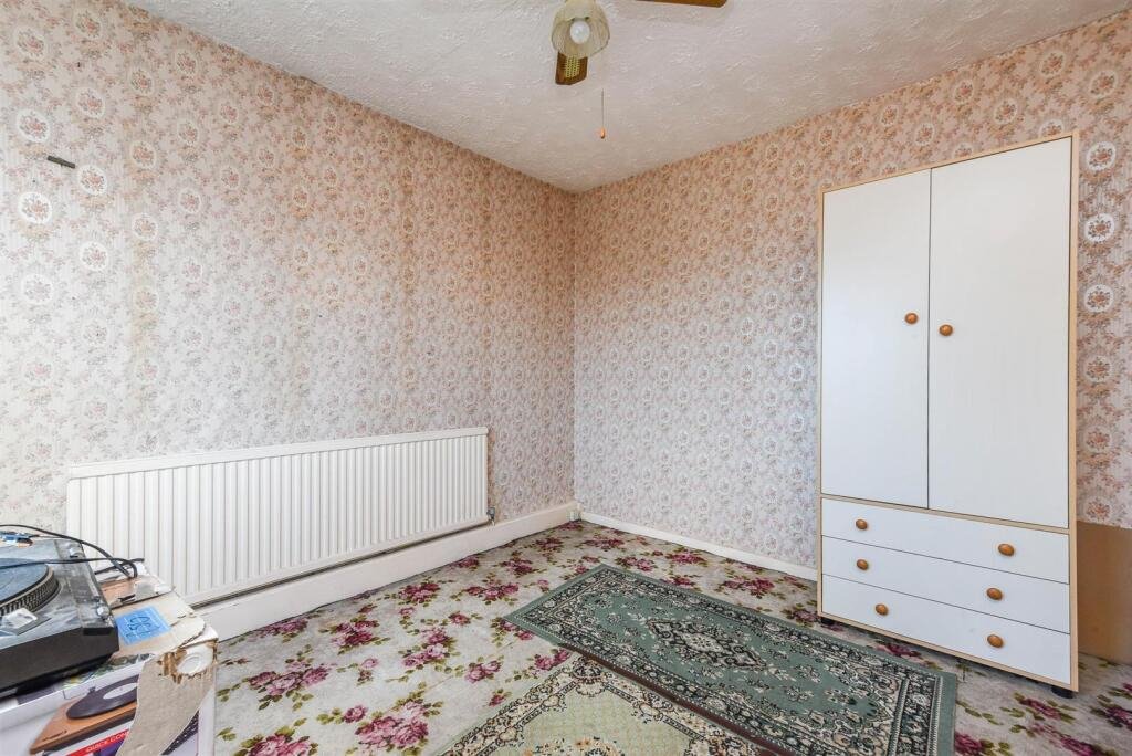 A three bedroom home priced at £130,000 has caught attention for its unusual layout, featuring a fully plumbed toilet sitting openly inside a glass conservatory