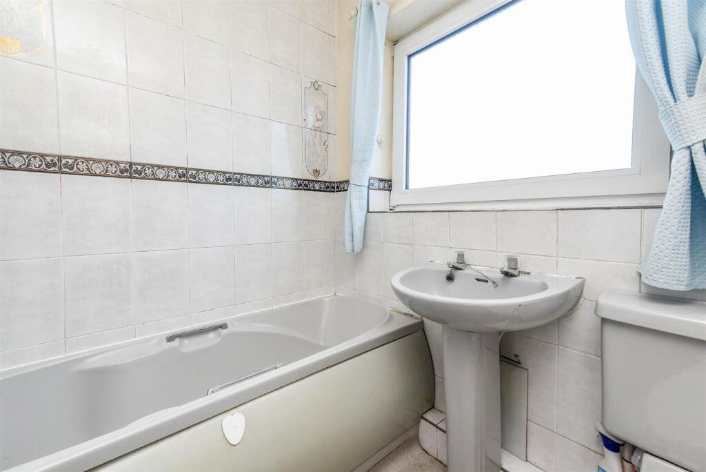 A three bedroom home priced at £130,000 has caught attention for its unusual layout, featuring a fully plumbed toilet sitting openly inside a glass conservatory