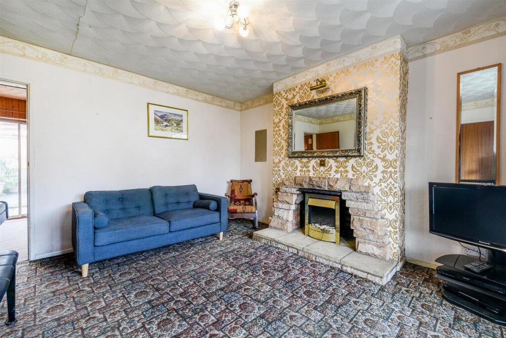 A three bedroom home priced at £130,000 has caught attention for its unusual layout, featuring a fully plumbed toilet sitting openly inside a glass conservatory