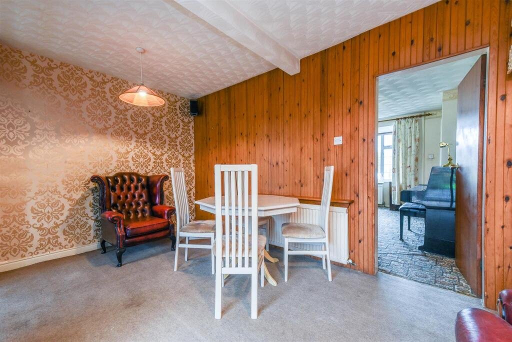 A three bedroom home priced at £130,000 has caught attention for its unusual layout, featuring a fully plumbed toilet sitting openly inside a glass conservatory