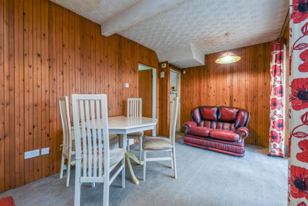 A three bedroom home priced at £130,000 has caught attention for its unusual layout, featuring a fully plumbed toilet sitting openly inside a glass conservatory