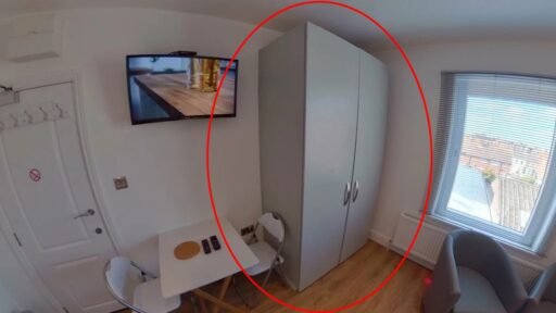 A £920 a month studio flat sparks shock after revealing a full kitchen hidden inside a cupboard at the foot of the bed, cramming living, dining and cooking into one tiny space.