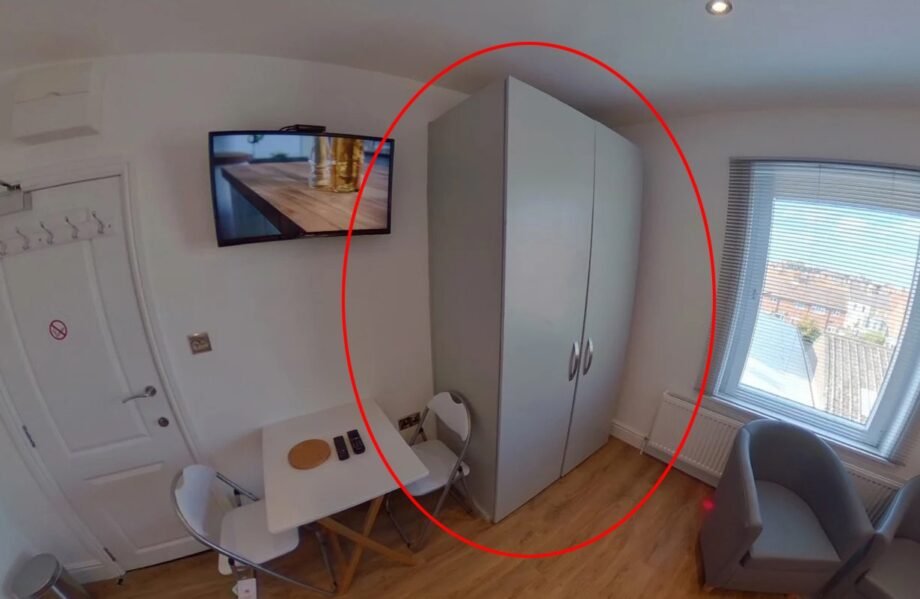 A £920 a month studio flat sparks shock after revealing a full kitchen hidden inside a cupboard at the foot of the bed, cramming living, dining and cooking into one tiny space.