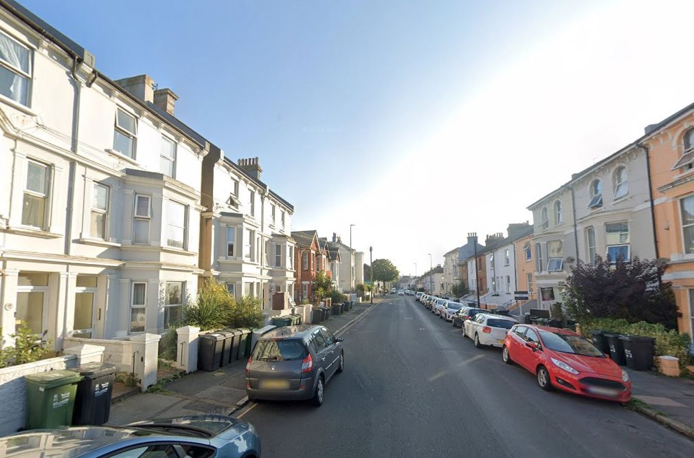 A £920 a month studio flat sparks shock after revealing a full kitchen hidden inside a cupboard at the foot of the bed, cramming living, dining and cooking into one tiny space.