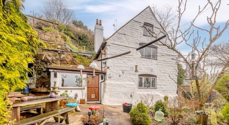 Dating back to 1511, this rare sandstone cave cottage with a bedroom carved into rock is for sale at £525,000, set in 2.5 acres near Kidderminster. Worcestershire UK sale