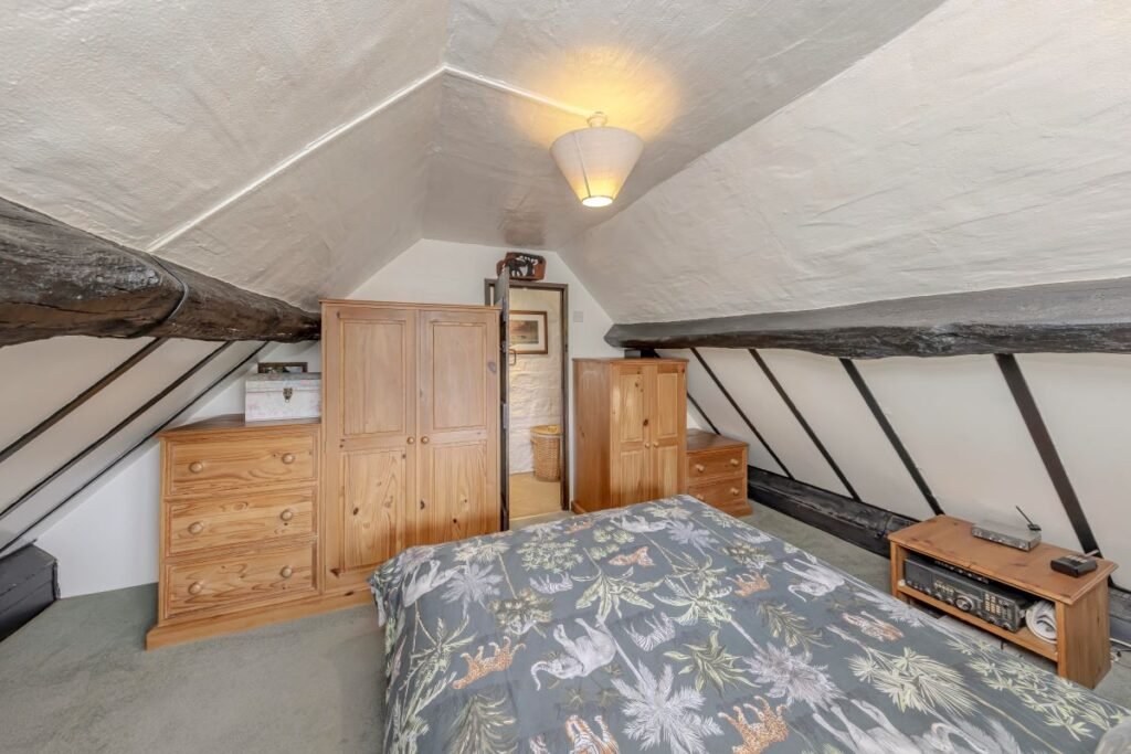 Dating back to 1511, this rare sandstone cave cottage with a bedroom carved into rock is for sale at £525,000, set in 2.5 acres near Kidderminster. Worcestershire UK sale