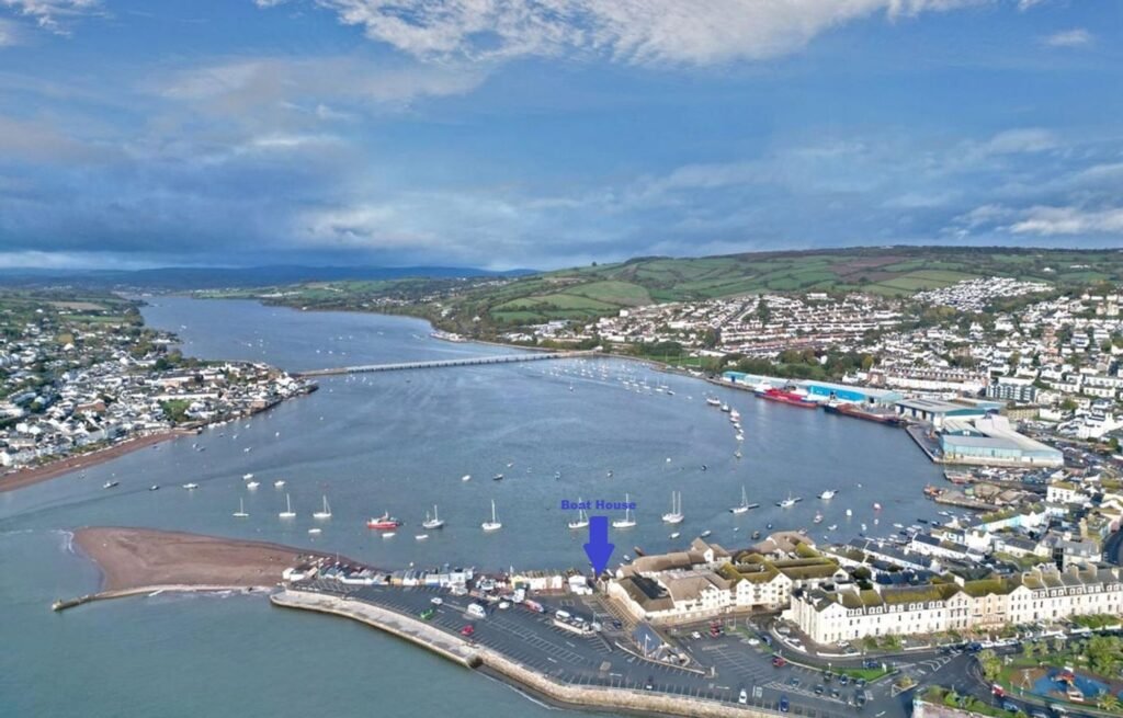 A one room wooden beach hut in Teignmouth is on sale for £175,000, offering freehold status, estuary views and a historic past as a former harbour pilots base