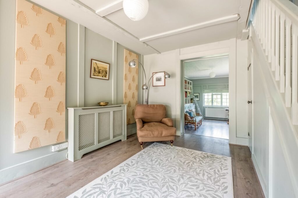 A Georgian country home once owned by James Bond’s gadget master Q hits the market, blending historic charm with modern upgrades and strong eco credentials in a sought-after setting