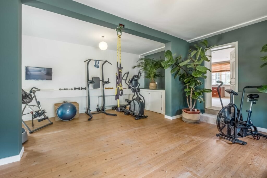 A Georgian country home once owned by James Bond’s gadget master Q hits the market, blending historic charm with modern upgrades and strong eco credentials in a sought-after setting