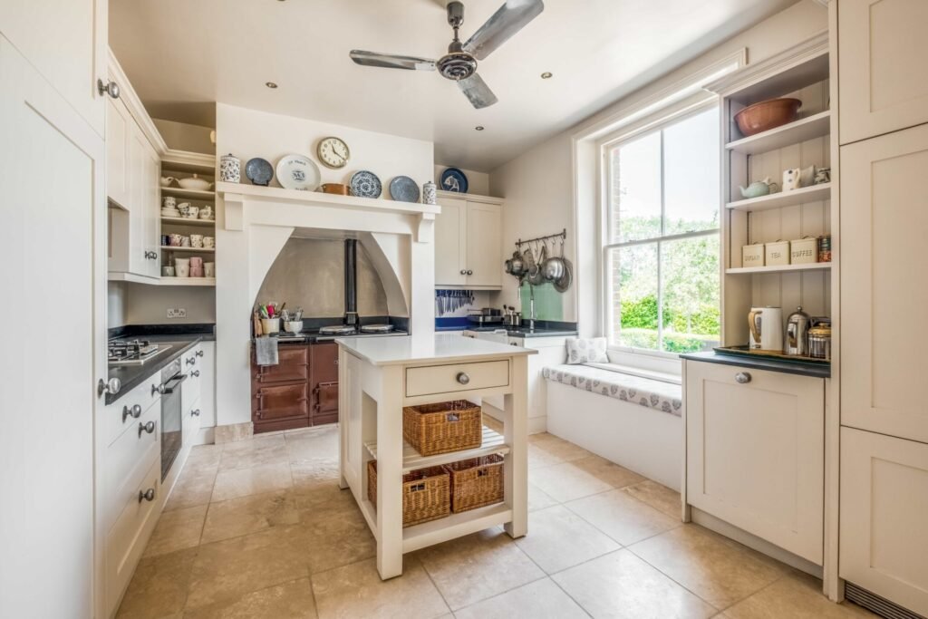 A Georgian country home once owned by James Bond’s gadget master Q hits the market, blending historic charm with modern upgrades and strong eco credentials in a sought-after setting