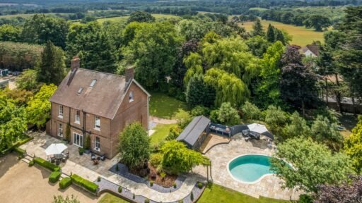 A Georgian country home once owned by James Bond’s gadget master Q hits the market, blending historic charm with modern upgrades and strong eco credentials in a sought-after setting