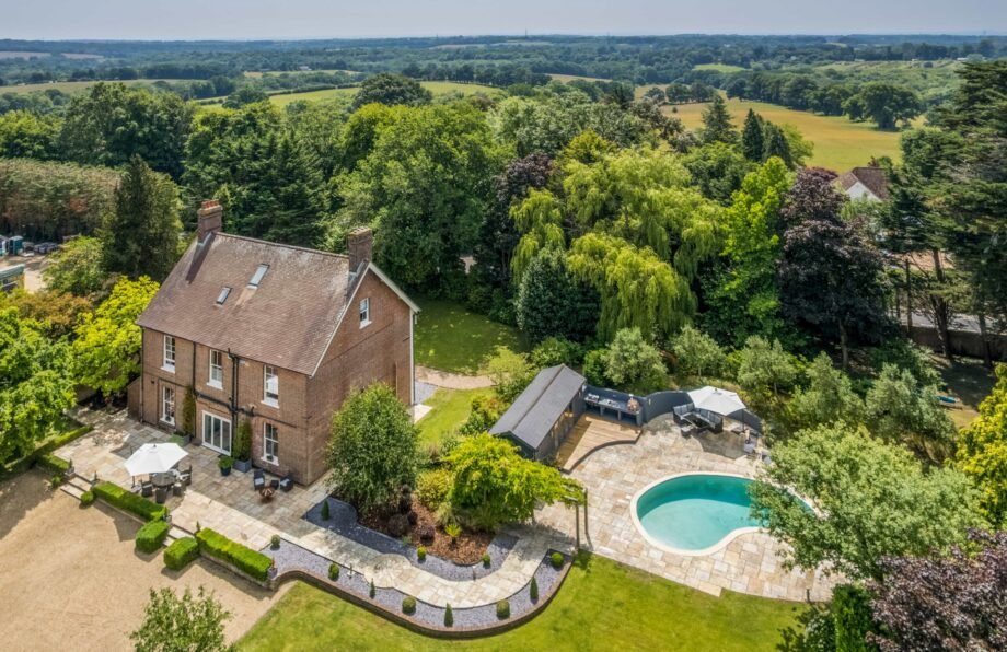 A Georgian country home once owned by James Bond’s gadget master Q hits the market, blending historic charm with modern upgrades and strong eco credentials in a sought-after setting