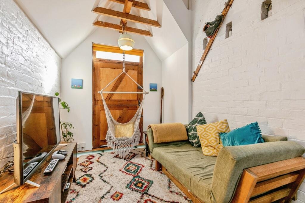 A quirky Bristol home barely wider than a tube carriage has hit the market for £325,000, packing clever design, a raised sleeping platform and cosy features into just 7ft 5in.