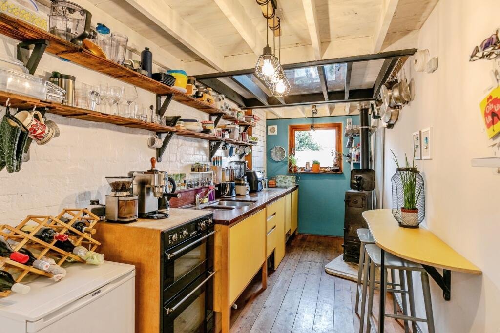 A quirky Bristol home barely wider than a tube carriage has hit the market for £325,000, packing clever design, a raised sleeping platform and cosy features into just 7ft 5in.