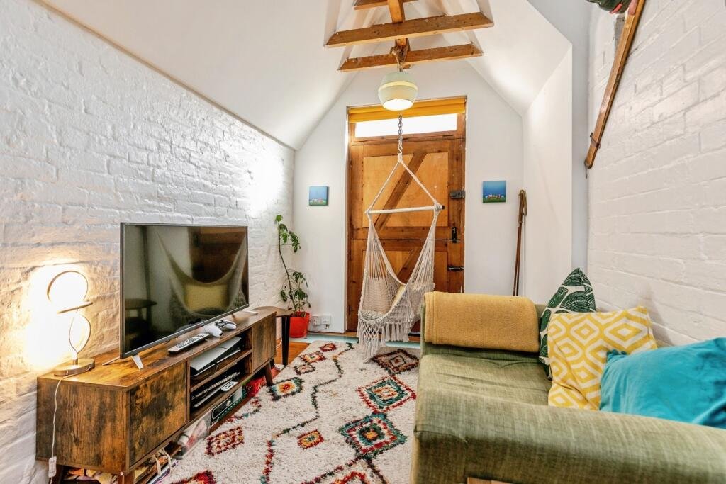A quirky Bristol home barely wider than a tube carriage has hit the market for £325,000, packing clever design, a raised sleeping platform and cosy features into just 7ft 5in.