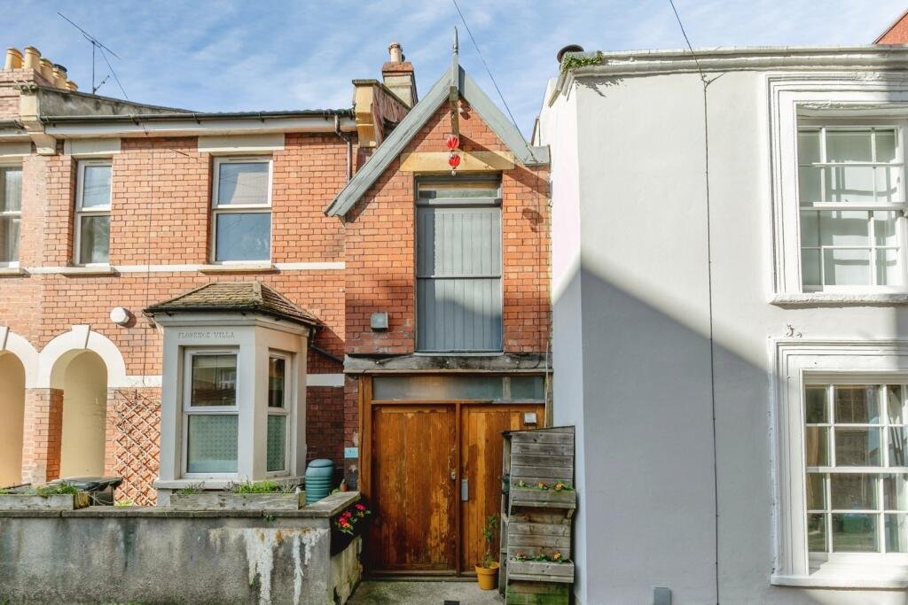 A quirky Bristol home barely wider than a tube carriage has hit the market for £325,000, packing clever design, a raised sleeping platform and cosy features into just 7ft 5in.