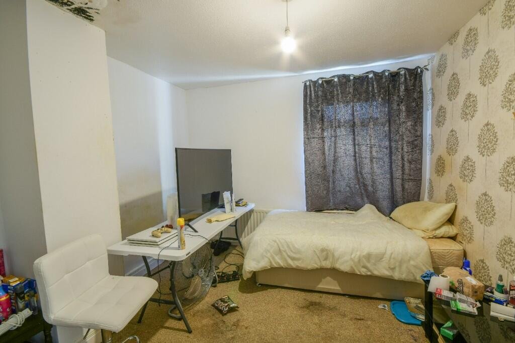 A quirky home packed with 13 slot machines has gone on sale for £92,000, offering rental income and a unique arcade-style room but struggling to attract buyers