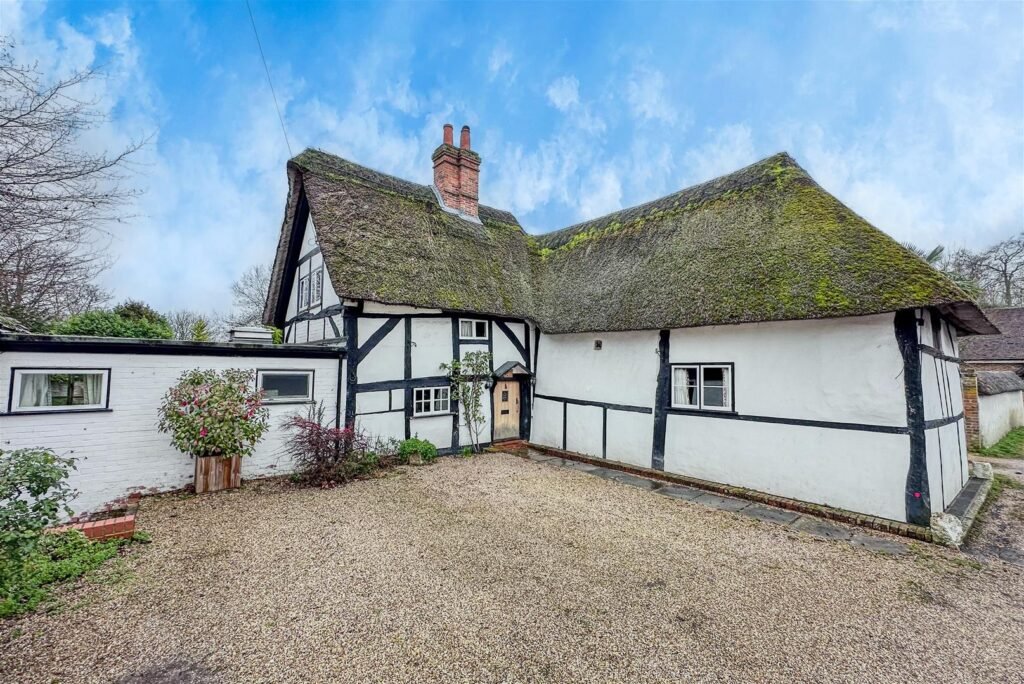 A three bedroom thatched home built in 1286 during King Edward II reign is on sale for £700,000, offering buyers a rare chance to own medieval history.