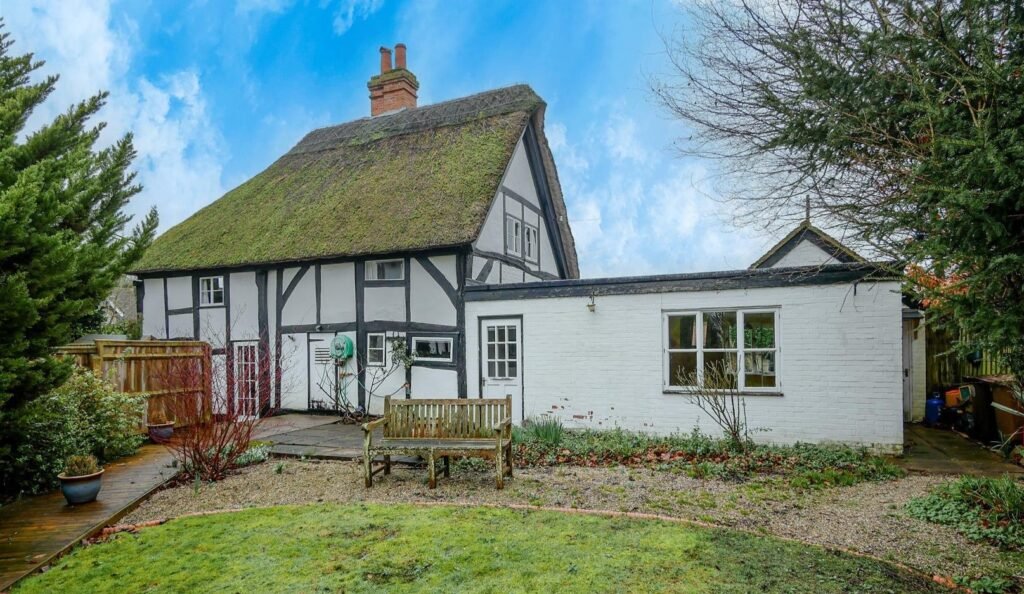 A three bedroom thatched home built in 1286 during King Edward II reign is on sale for £700,000, offering buyers a rare chance to own medieval history.