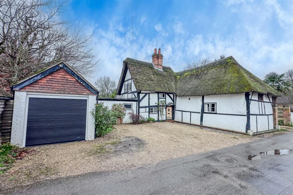 A three bedroom thatched home built in 1286 during King Edward II reign is on sale for £700,000, offering buyers a rare chance to own medieval history.