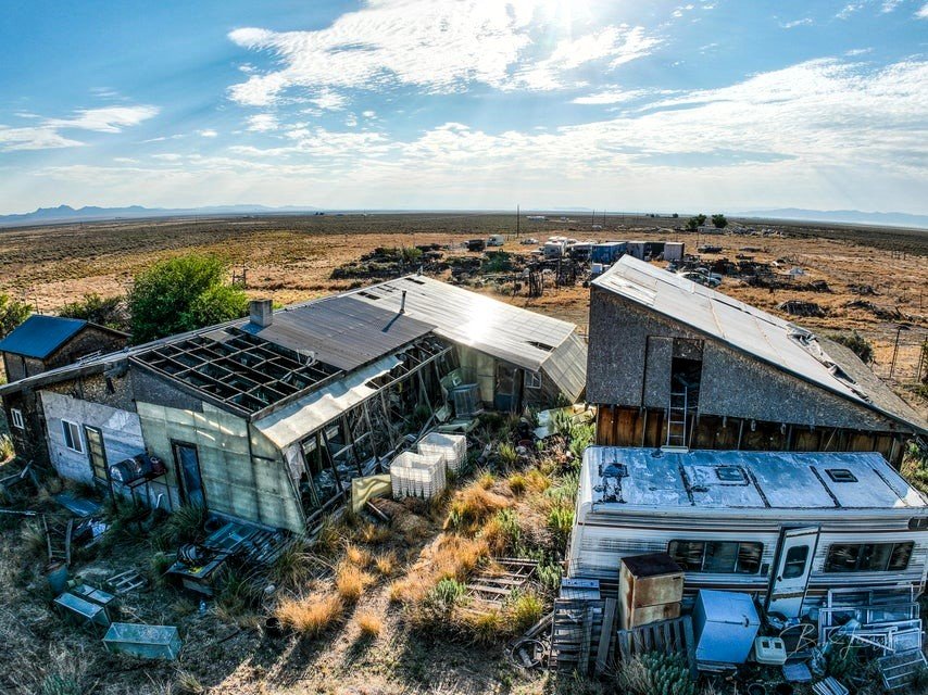 A remote “prepper’s paradise” packed with survival gear is up for £186,000, offering a fortified bunker-style home on 25 acres ready for life off the grid.